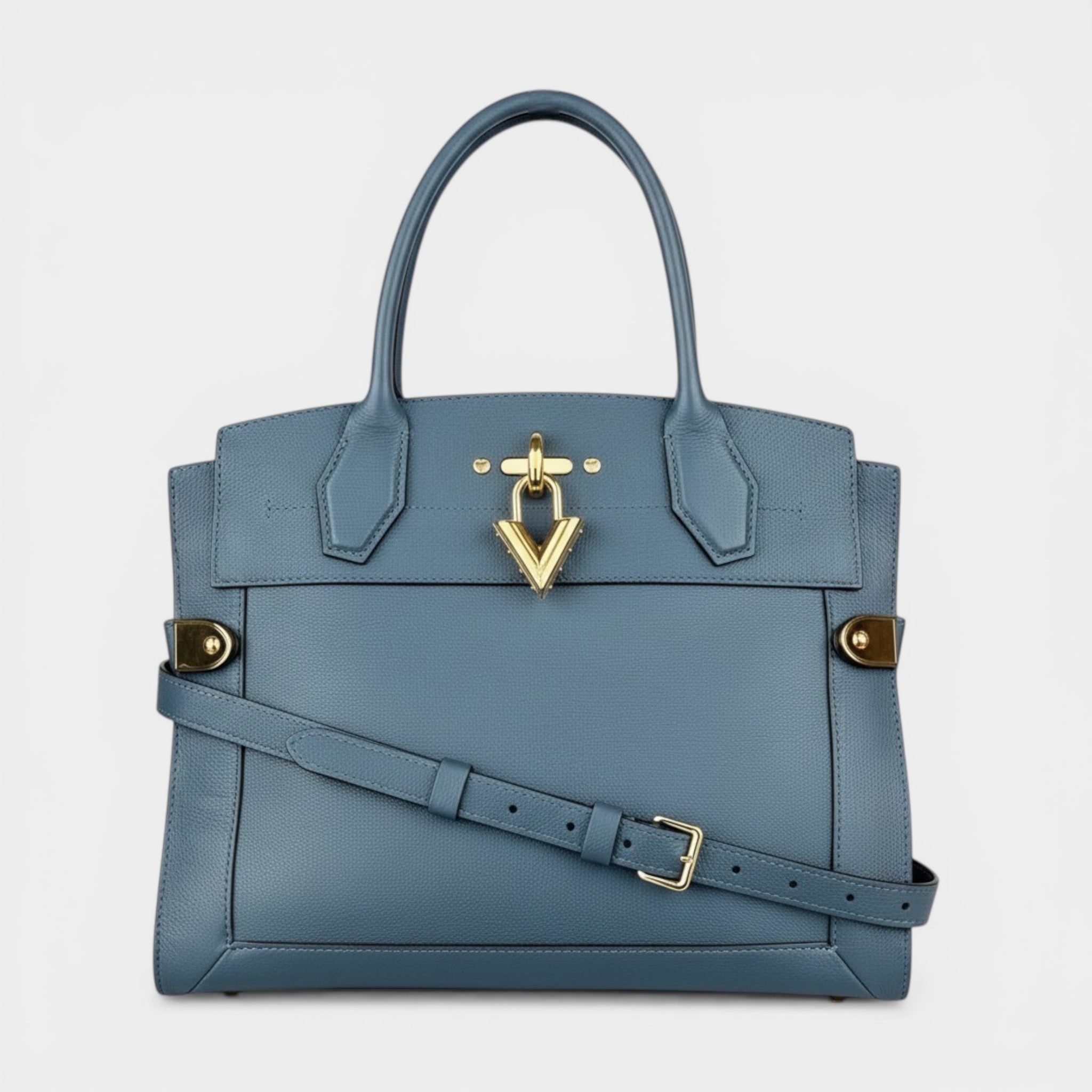 Secondtimearound Louis Vuitton Steamer MM bag in blue leather with gold hardware and a V-shaped clasp.