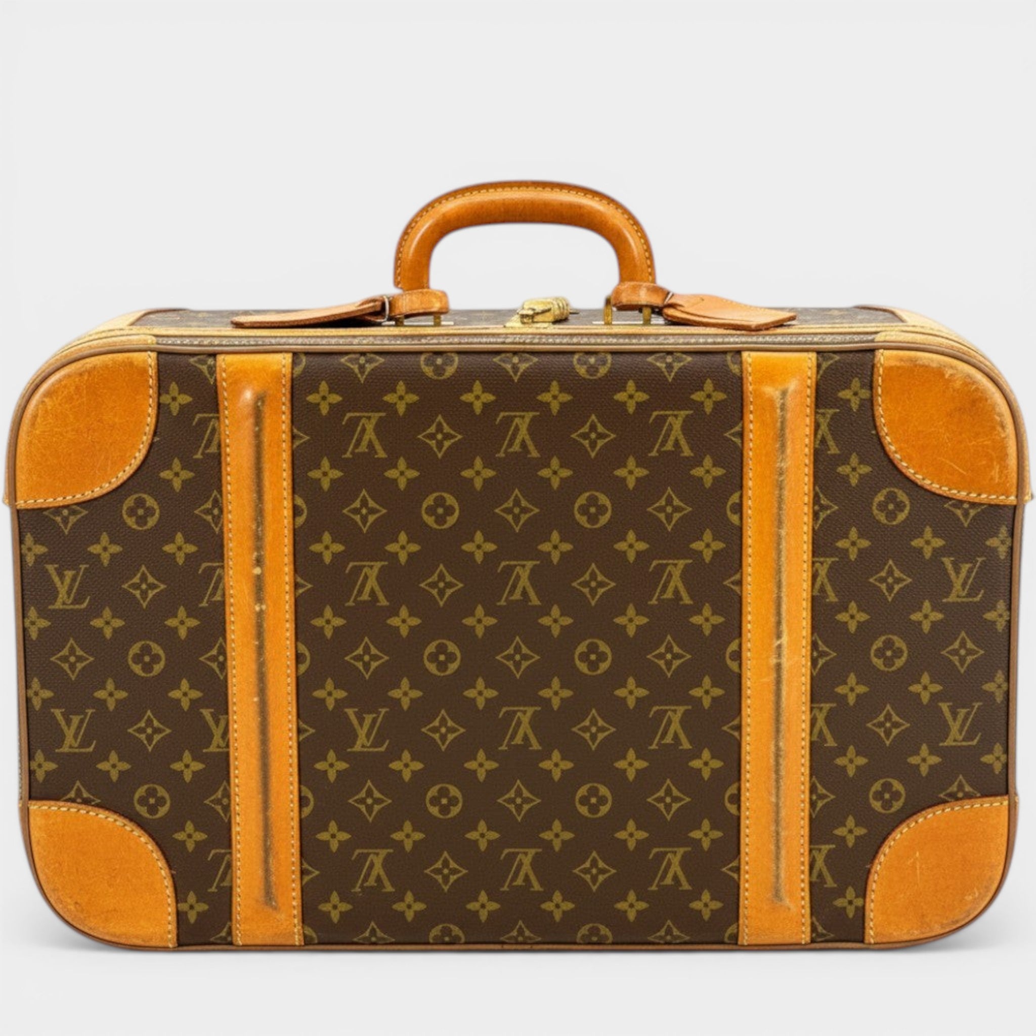 Secondtimearound Louis Vuitton Sirius 55 Monogram Canvas suitcase with leather trim and handle. Classic travel luggage.