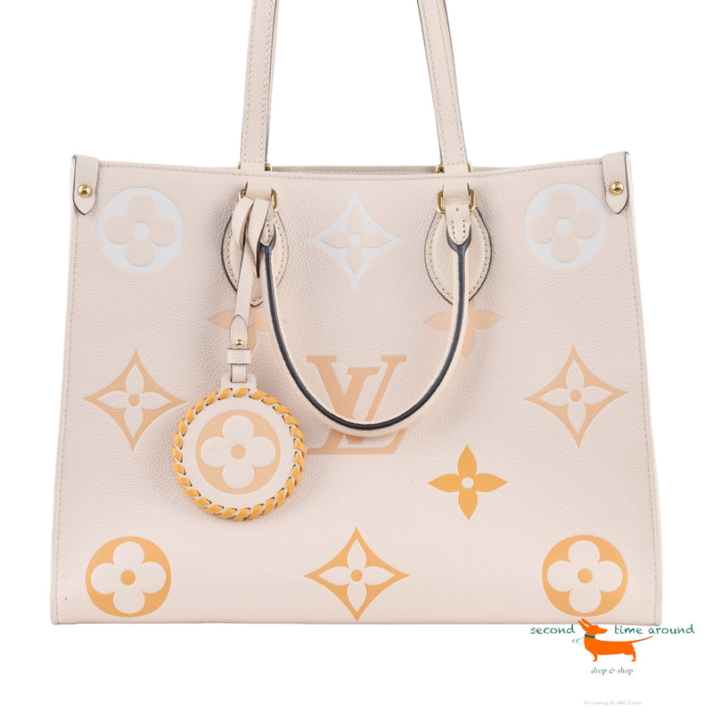 Louis Vuitton Onthego MM limited edition in beige imprint leather Bag