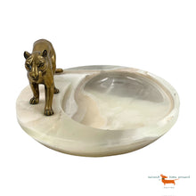 Leopard on a marbel bowl