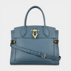 Secondtimearound Louis Vuitton Steamer MM bag in blue leather with gold hardware and a V-shaped clasp.