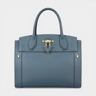 Secondtimearound Louis Vuitton Steamer MM bag in blue textured leather with gold hardware and a V-shaped clasp.