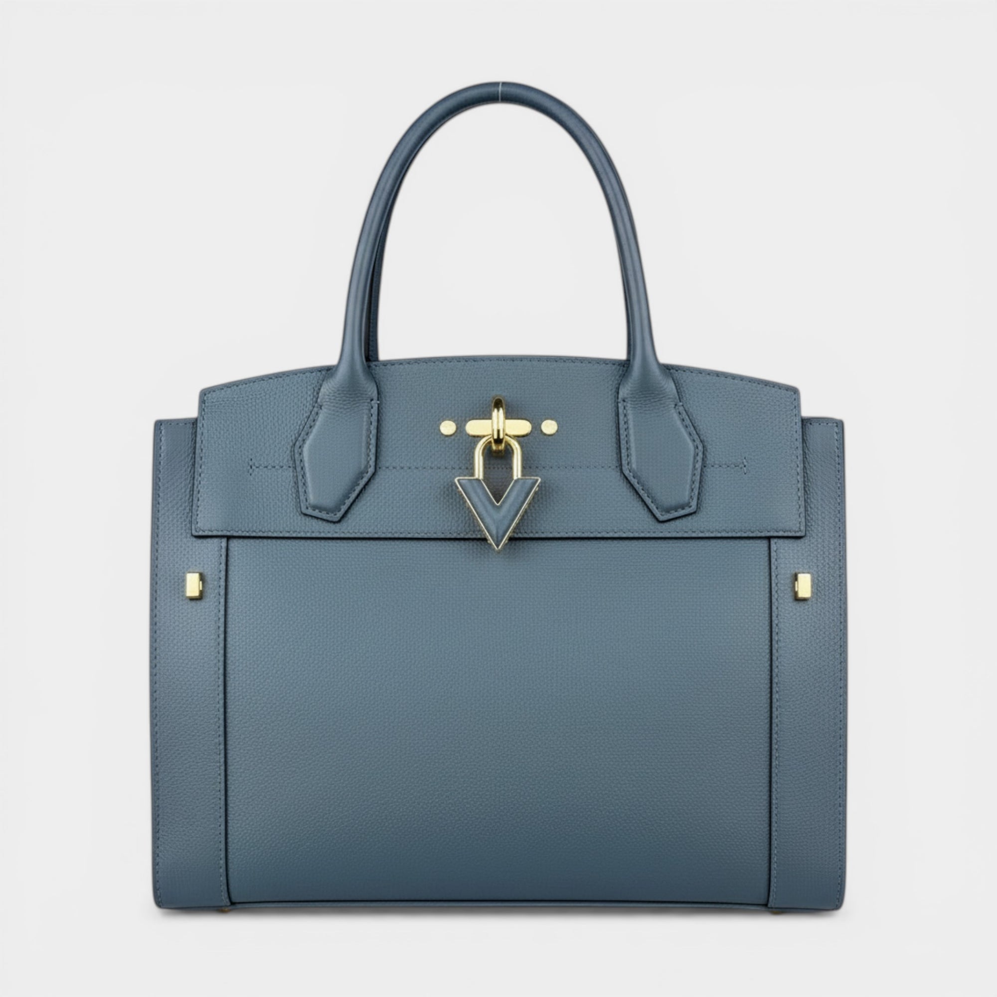 Secondtimearound Louis Vuitton Steamer MM bag in blue textured leather with gold hardware and a V-shaped clasp.