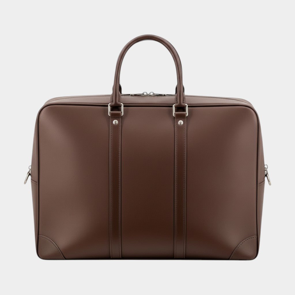 Secondtimearound brown leather briefcase with top handles and silver hardware. Classic design for business travel.