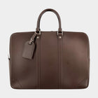 Secondtimearound dark brown leather briefcase with top handles and a luggage tag. Features subtle LV logo.