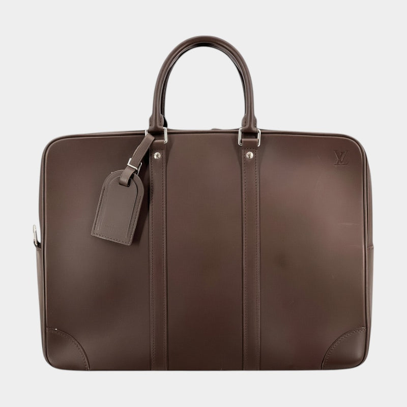 Secondtimearound dark brown leather briefcase with top handles and a luggage tag. Features subtle LV logo.
