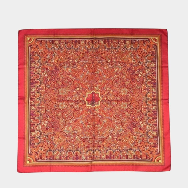 Secondtimearound Hermes Les Jardins d'Arménie silk scarf by Karen Petrossian, red with intricate floral and architectural patterns.