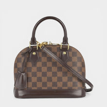 Secondtimearound Louis Vuitton Alma mini bag in brown Damier Ebene canvas with leather trim and gold hardware.
