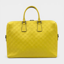 Secondtimearound Louis Vuitton Damier Infini Porte-Documents Jules yellow leather briefcase with embossed checkerboard pattern.