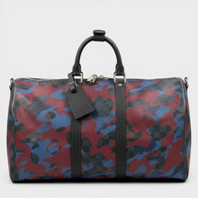 Secondtimearound Louis Vuitton Keepall 45 bag in Damier Cobalt Camouflage print with black leather trim and strap.