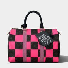 Secondtimearound Louis Vuitton Speedy 35 bag with brown monogram canvas and pink checkerboard overlay, black handles, and pink snakeskin trim.