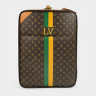 Secondtimearound Louis Vuitton limited edition monogram canvas trolley bag with green and yellow stripes and LV initials.